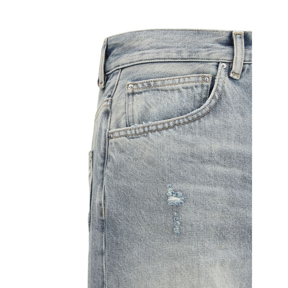 Amiri Blue Denim Released Jeans - Urban Elegance Redefined